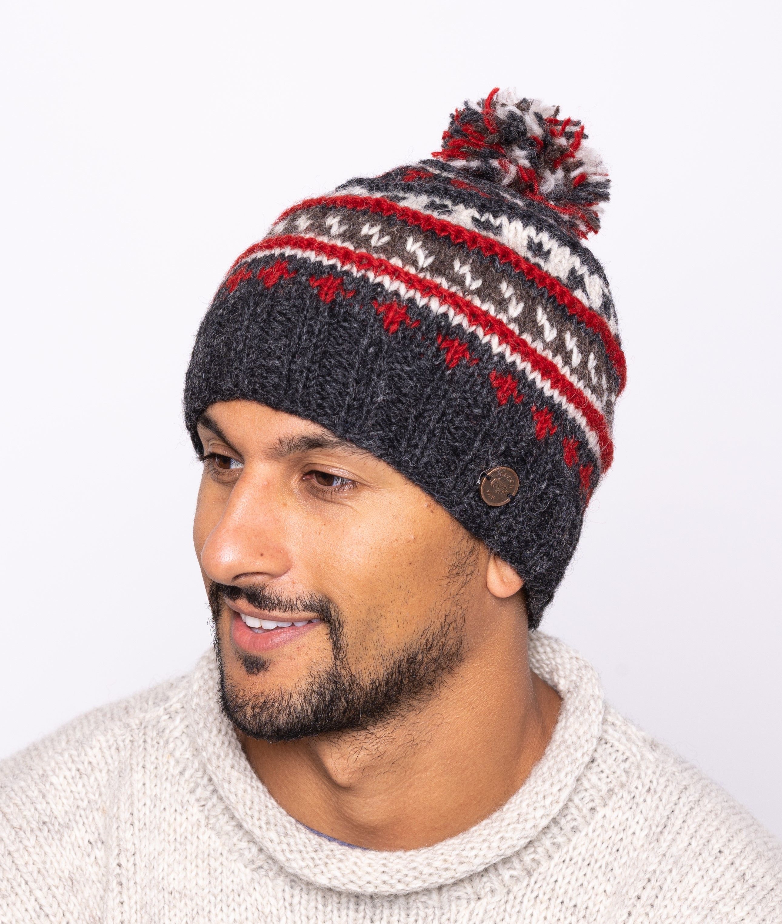Reverse ridge bobble hat in red and charcoal